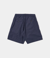 UNIVERSAL WORKS SHORT PLISSÉ TRACK 34151 POPELINE PEACHED NAVY - Shoelosophy