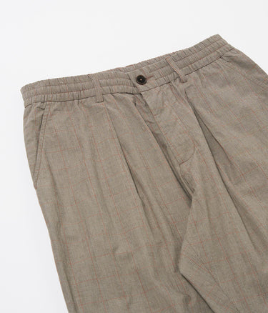 UNIVERSAL WORKS PLEATED TRACK PANT 34145 GREY BROWN WALES GLEN CHECK - Shoelosophy
