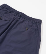UNIVERSAL WORKS SHORT PLISSÉ TRACK 34151 POPELINE PEACHED NAVY - Shoelosophy