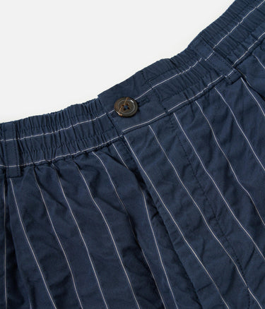 UNIVERSAL WORKS PLEATDED TRACK SHORT CHESTER STRIPE P34002 NAVY